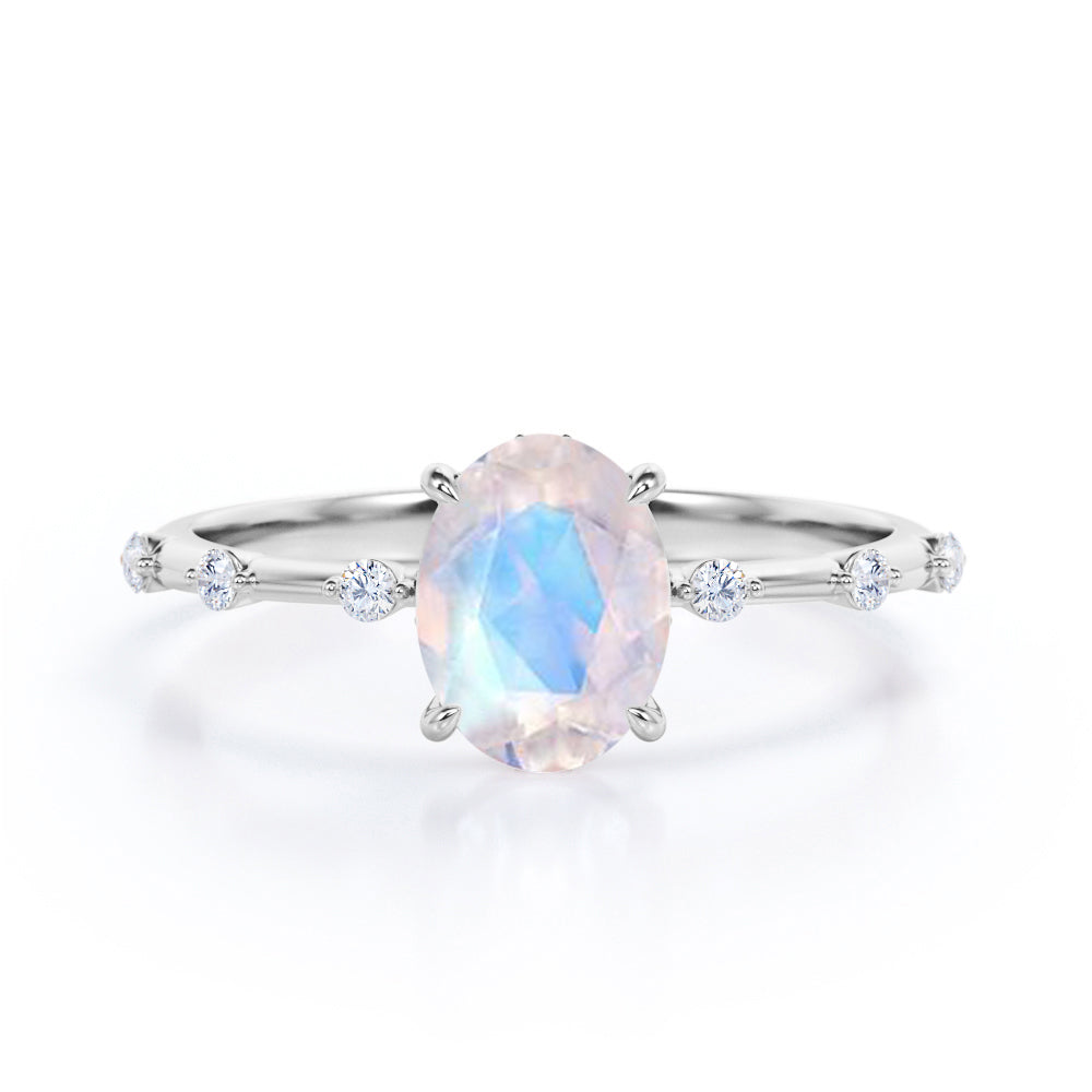 Branch Twig 1.1 carat Oval shaped Moonstone and diamond dainty engagement ring in Black gold