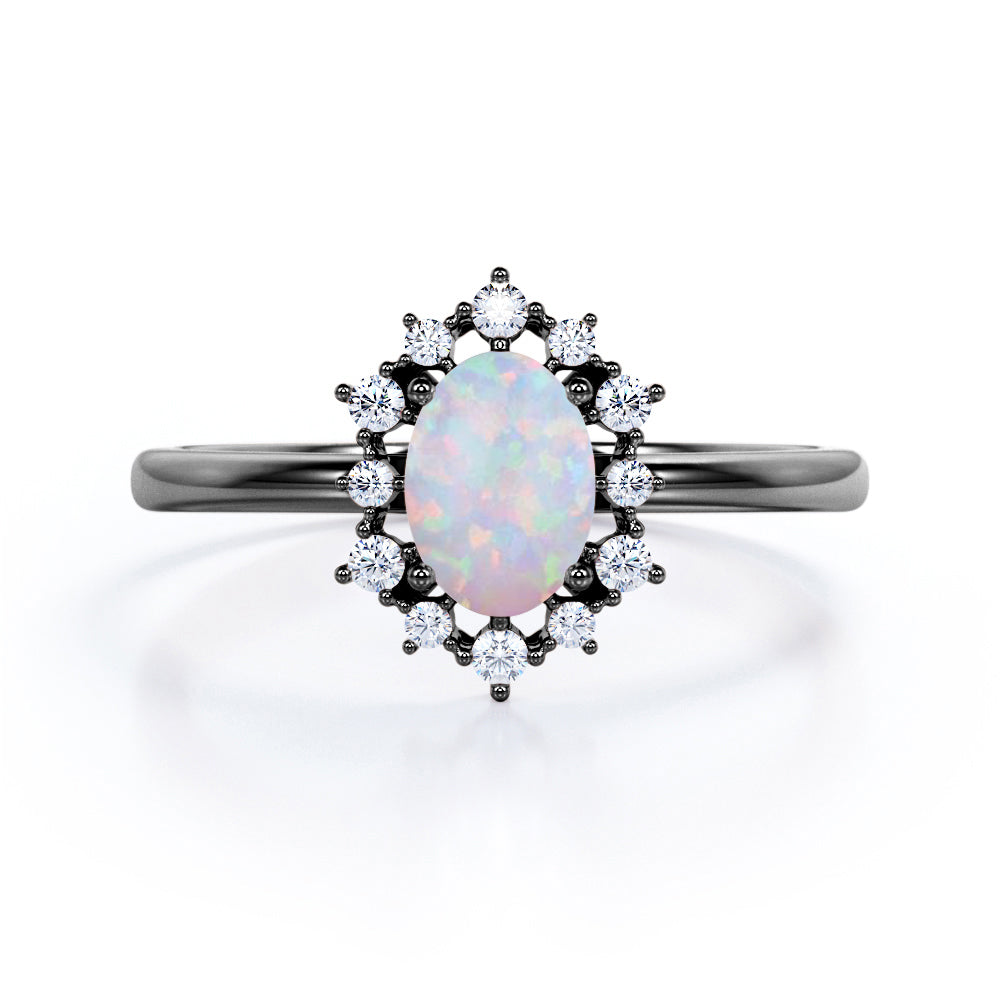 Intricate cluster 1.15 carat Oval cut Ethiopian Opal and diamond art deco engagement ring in Black gold
