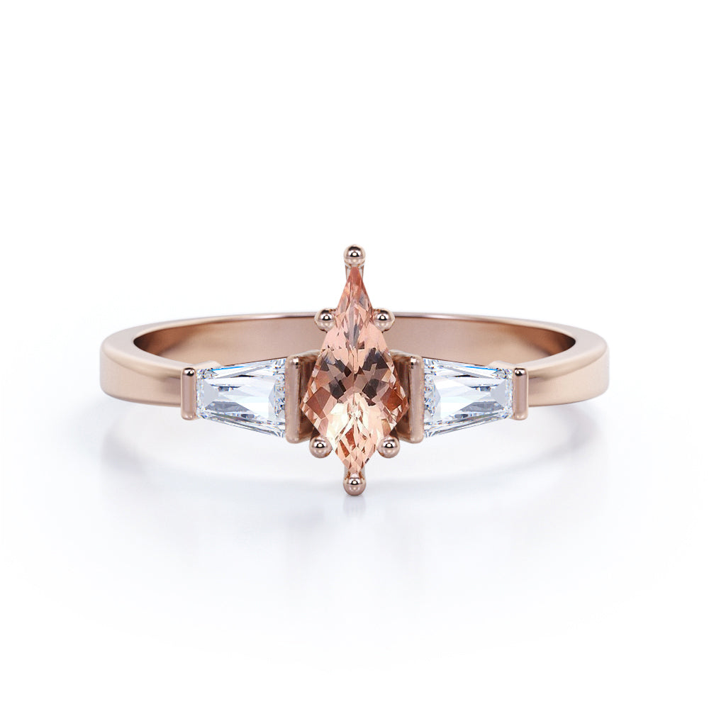Baguette style 1.1 carat Kite shaped Morganite and diamond three stone anniversary ring in Black gold