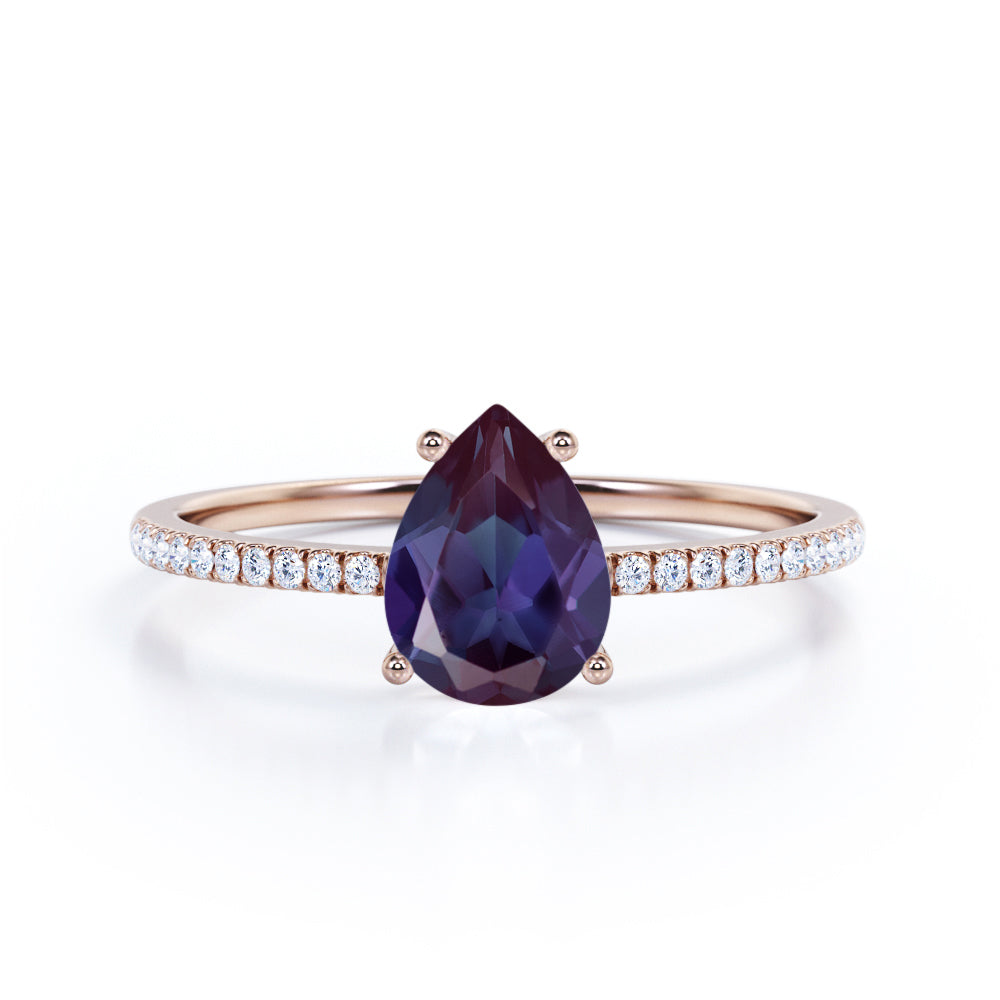 Classic 1.25 carat Pear cut Alexandrite and diamond eternity engagement ring in White gold