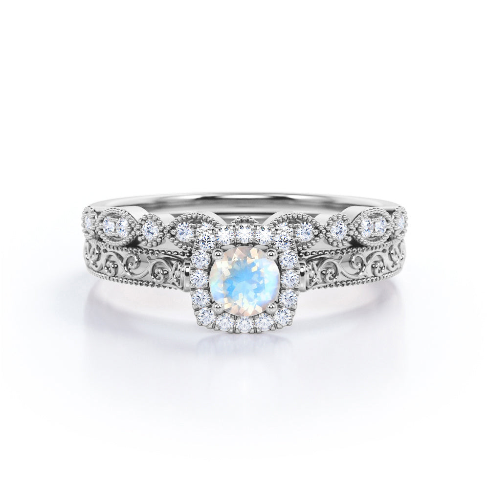 Antique Filigree and Milgrain 1.5 carat Round cut Moonstone and diamond square halo engagement ring in yellow gold