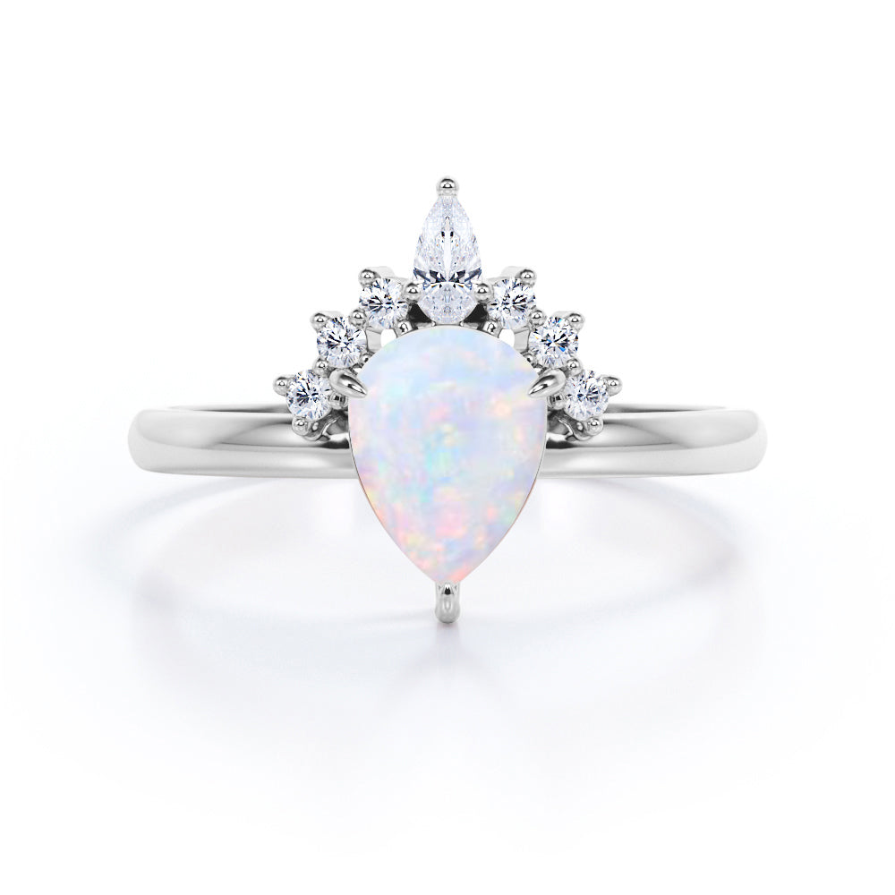 Antique Crown inspired 1.15 carat Pear cut Ethiopian Opal and diamond claw prong setting engagement ring in Rose gold