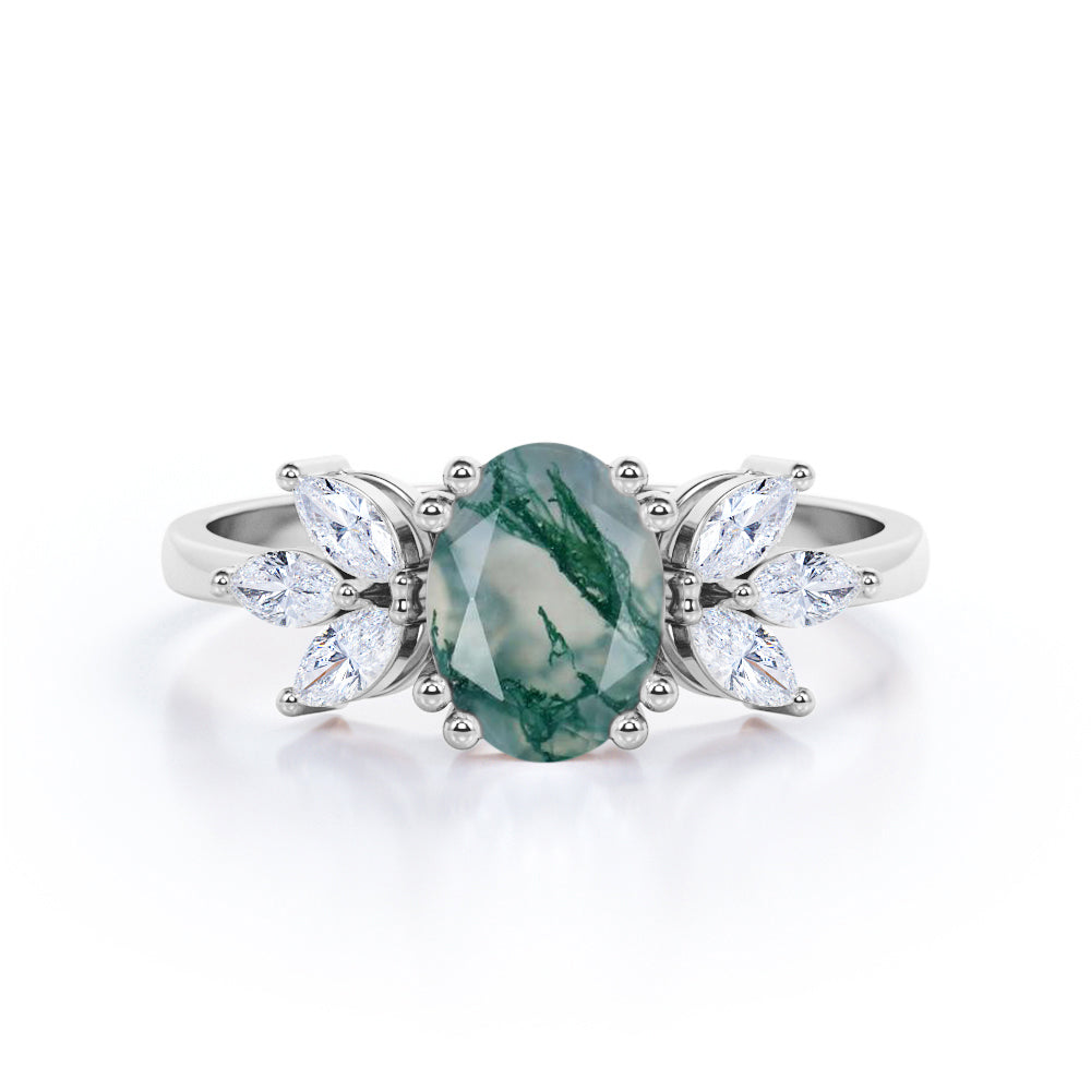 Double prong style 1.15 carat Oval cut Moss Green Agate and diamond seven stone engagement ring in yellow gold