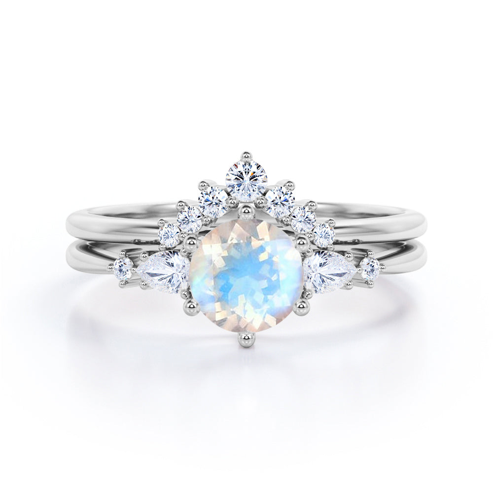 Antique Chevron 1.4 carat Round cut Blue Moonstone and diamond tapered style Bridal set for women in Black gold