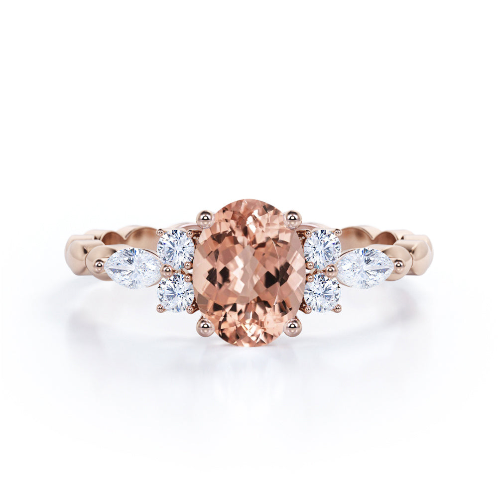 Twisted Bands 1.15 carat Oval shaped Peach Morganite and diamond flower style engagement ring in White gold