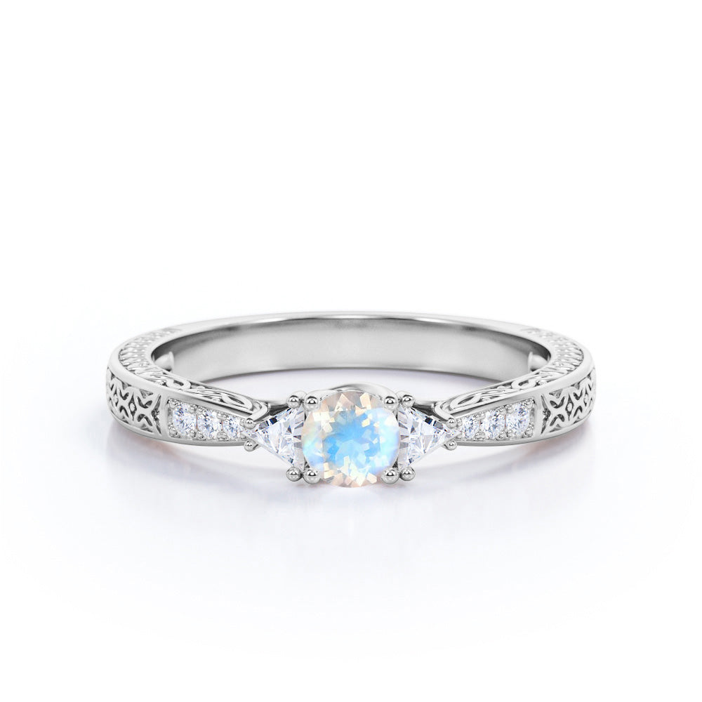 Vintage Filigree 1.15 carat Round cut Moonstone and diamond trillion cut engagement ring for women in Rose gold