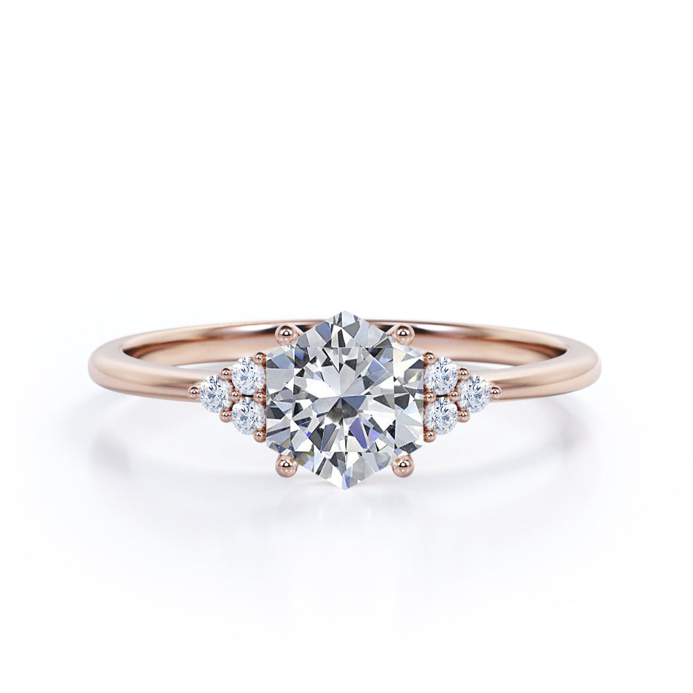 Modern 1 carat Hexagonal Moissanite and diamond tapered knife edge engagement ring in White gold