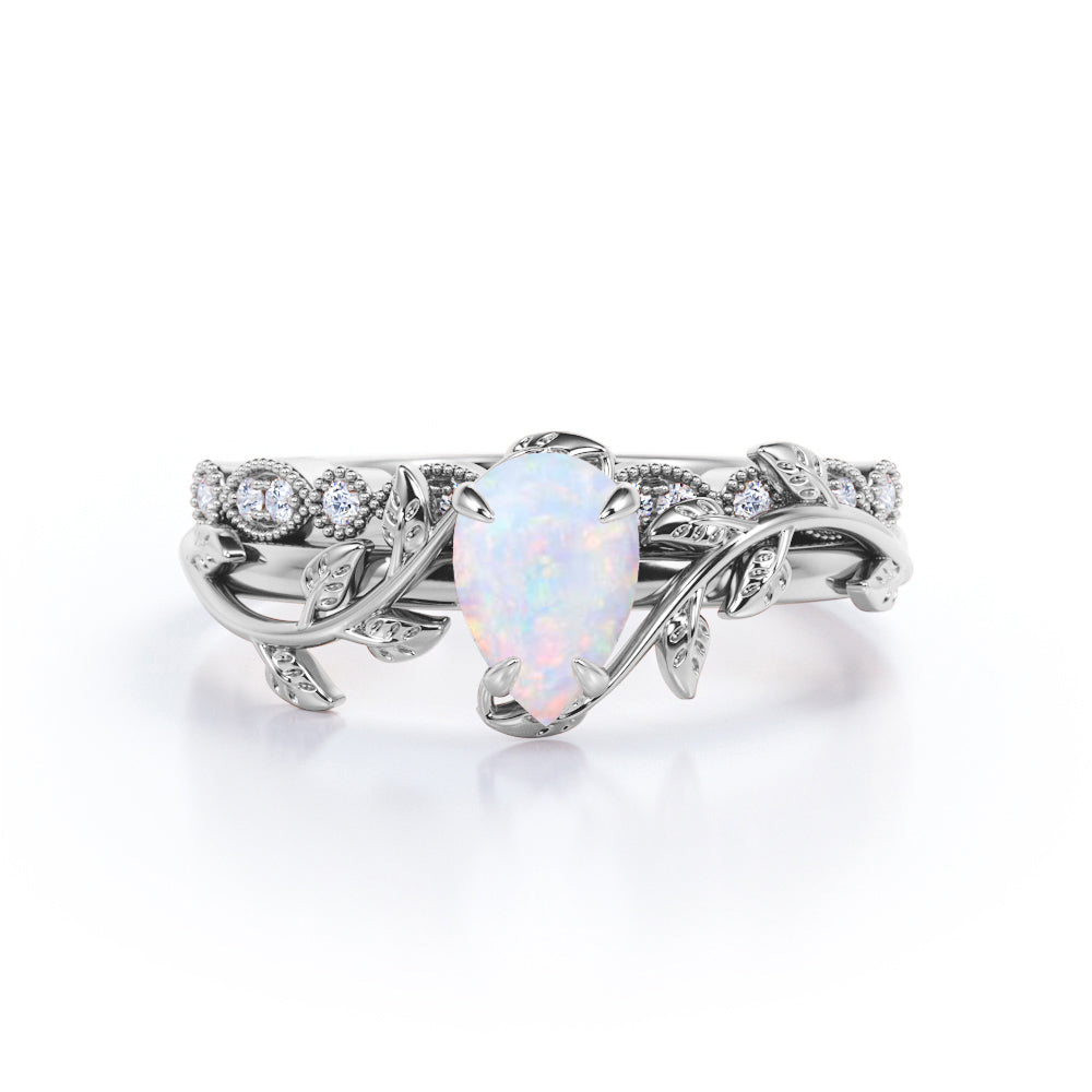 Art deco 1.15 carat Nature-inspired Pear cut Solid welo Opal with half-pave milgrain diamond Wedding ring set for women