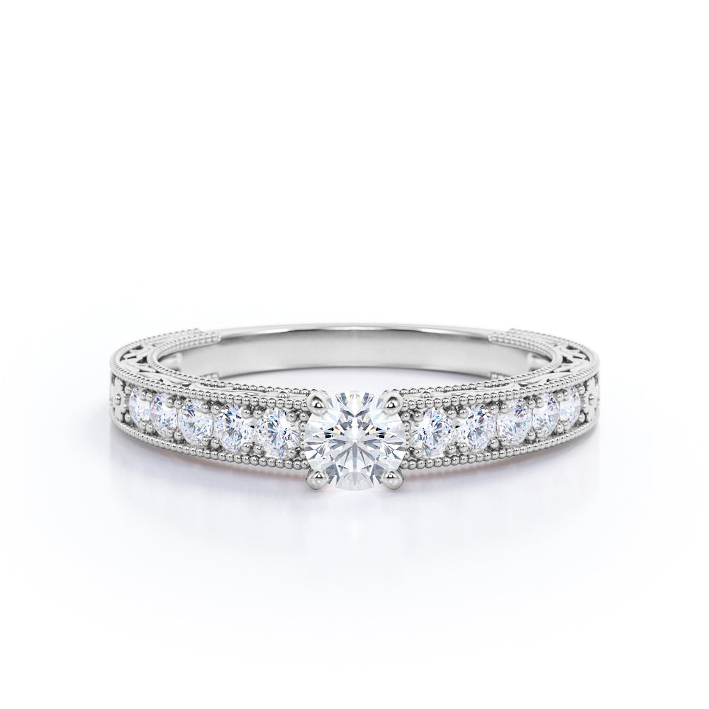 Victorian style 0.6 carat Round cut Moissanite and diamond Milgrain and filigree engagement ring in Rose gold
