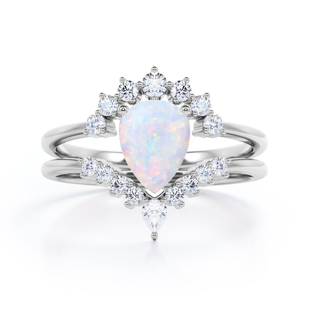Royal Crown inspired 1.15 carat Pear cut Opal and diamond chevron wedding ring set for women in Rose gold