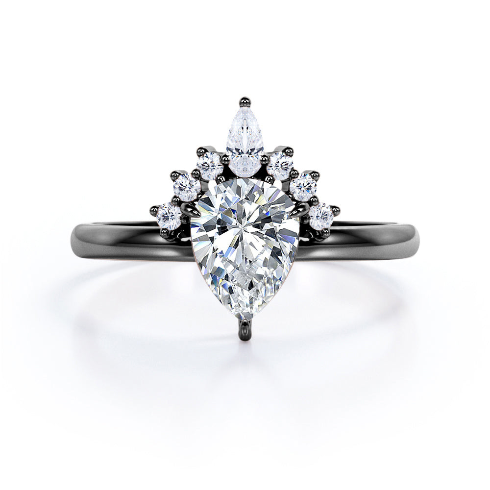 Chevron crown inspired 1.1 carat Pear shaped Moissanite and diamond engagement ring in Rose gold