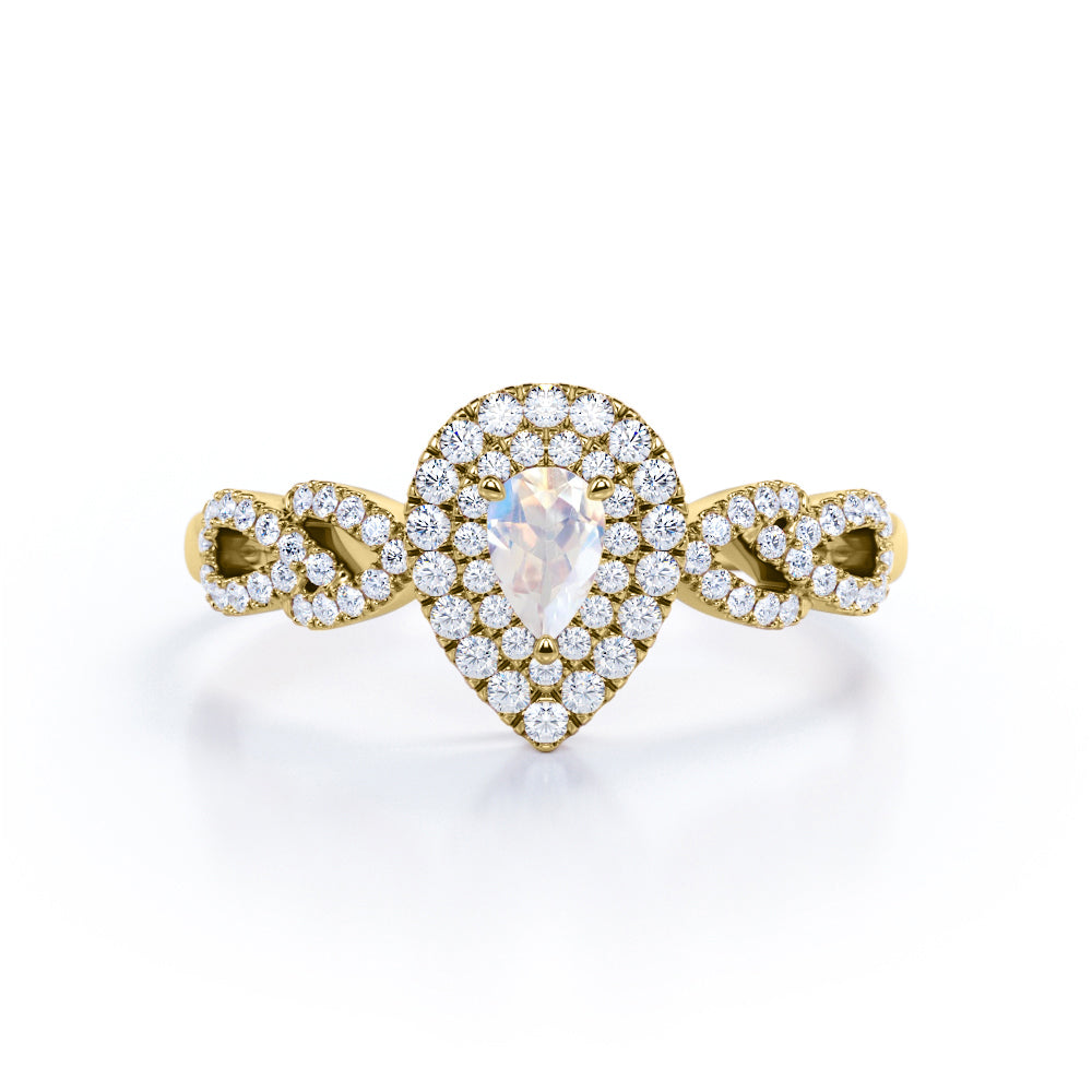 Intertwined 1.7 carat Pear shaped Blue Moonstone and diamond twisted infinity halo engagement ring in White gold