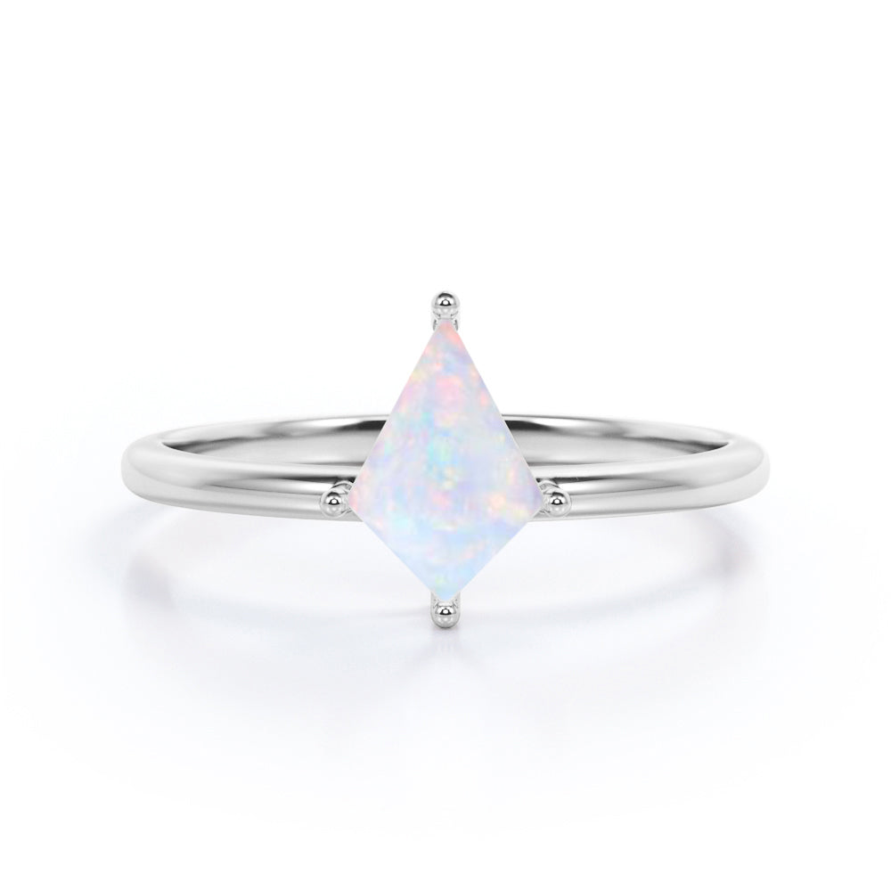 Classic 4 prong 1 carat Kite cut Ethiopian Opal solitaire engagement ring in Black gold