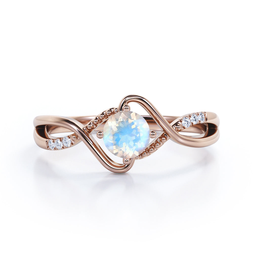 Trendy Twists 0.6 carat Round cut Rainbow Moonstone and diamond infinity pave engagement ring in White gold