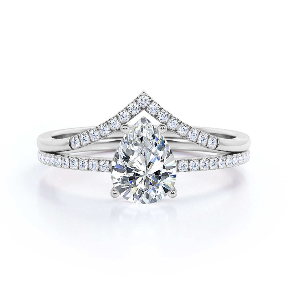 Vintage inspired 1.35 carat Pear cut Moissanite and diamond crown wedding ring set for women in rose gold