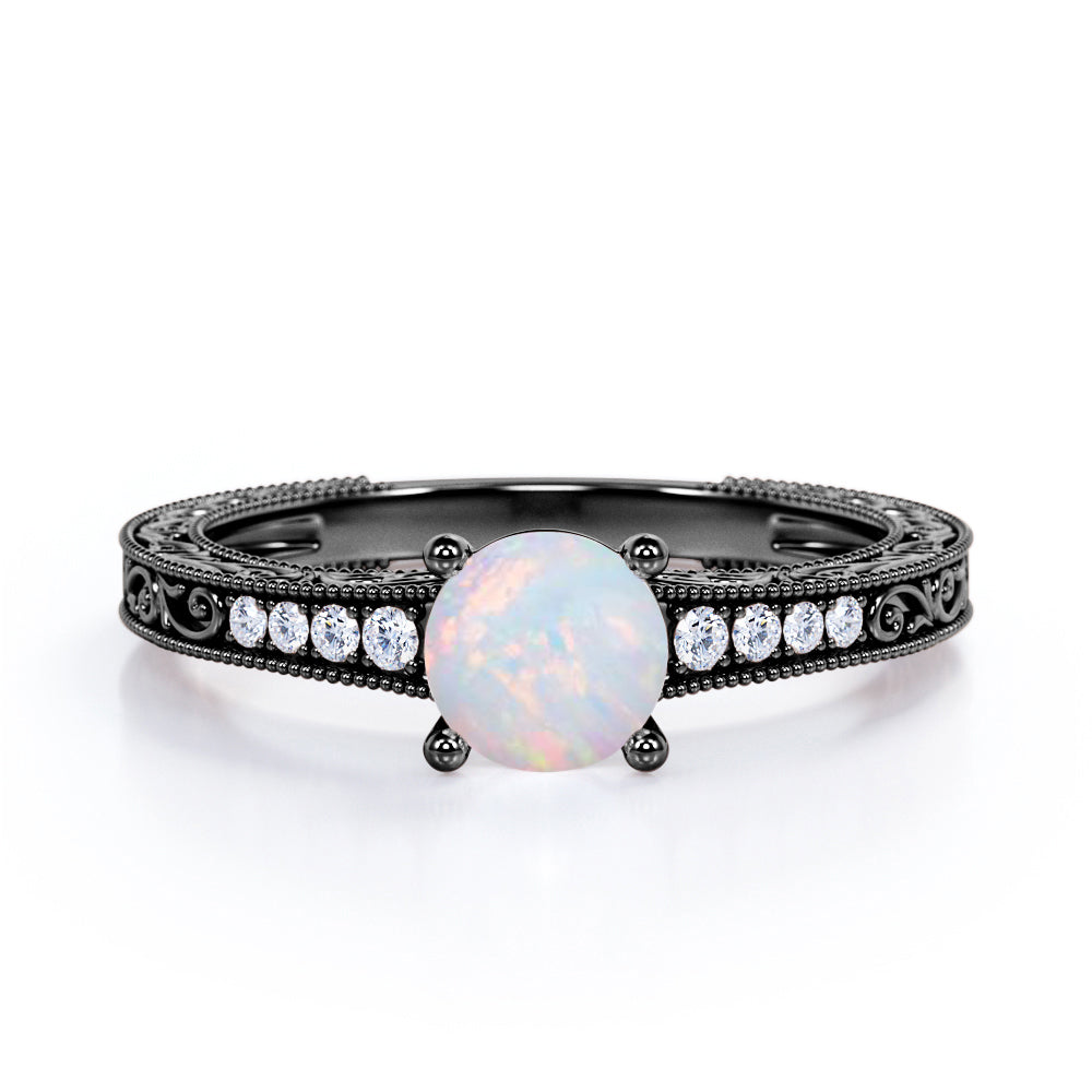Vintage Edwardian style 1.1 carat Round cut Australian Boulder Opal and diamond filigree and milgrain engagement ring in White gold
