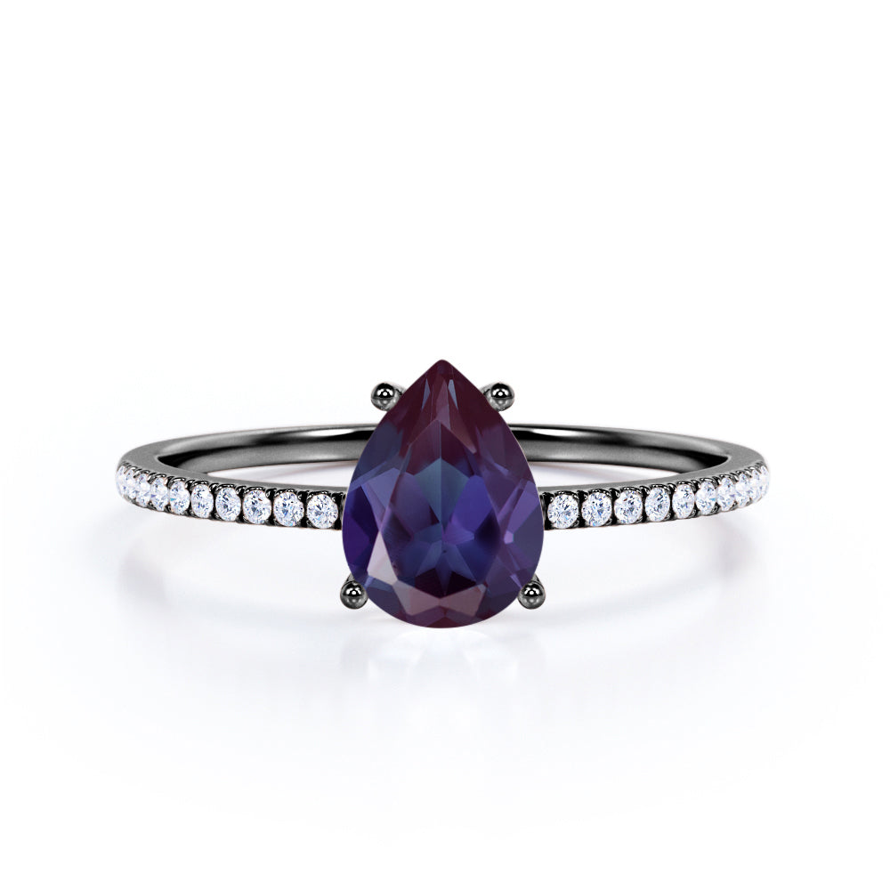 Classic 1.25 carat Pear cut Alexandrite and diamond eternity engagement ring in White gold
