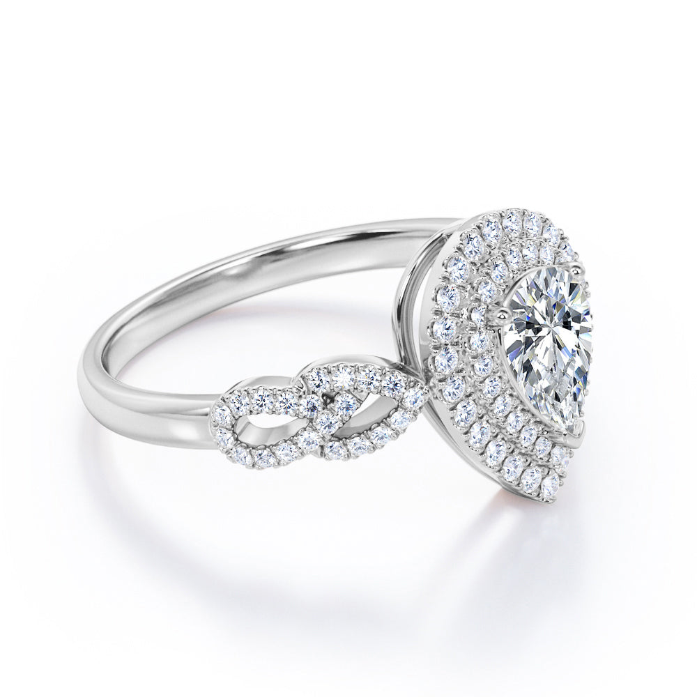 Artistic infinity 1.75 carat Pear cut Moissanite and diamond vintage halo engagement ring in Black gold