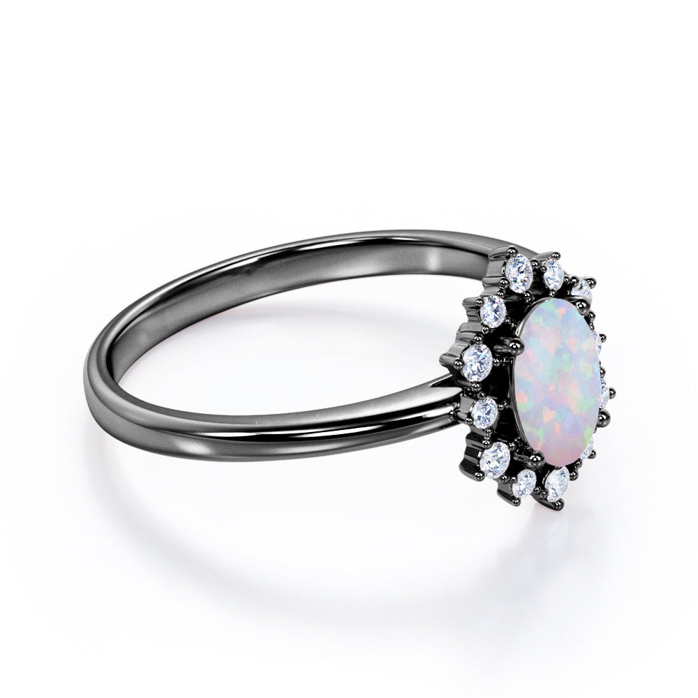 Intricate cluster 1.15 carat Oval cut Ethiopian Opal and diamond art deco engagement ring in Black gold