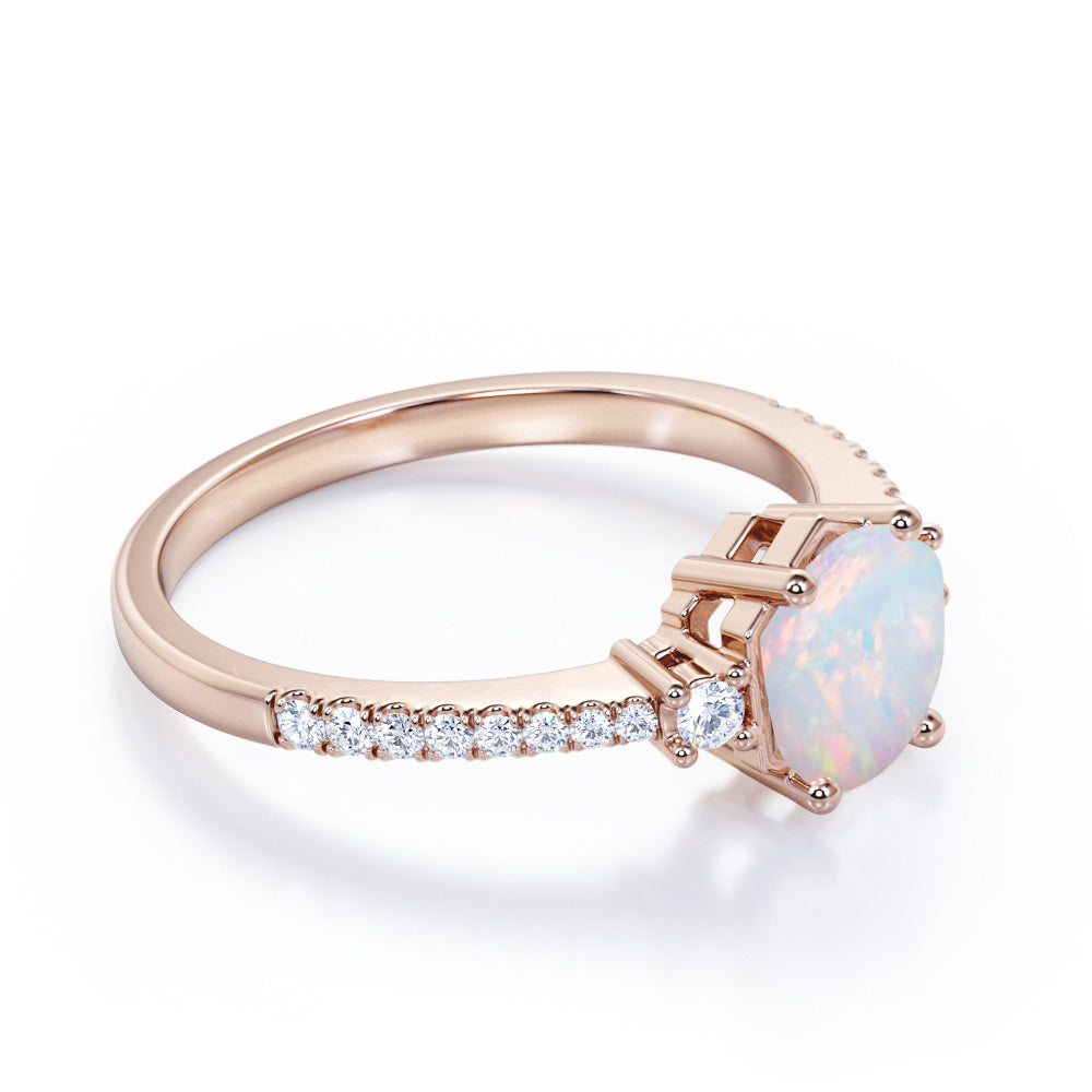Contemporary 3 stone 1.2 carat Round cut Ethiopian Opal and diamond basket setting low basket setting engagement ring in White gold