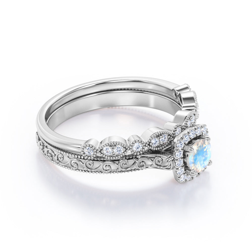 Antique Filigree and Milgrain 1.5 carat Round cut Moonstone and diamond square halo engagement ring in yellow gold
