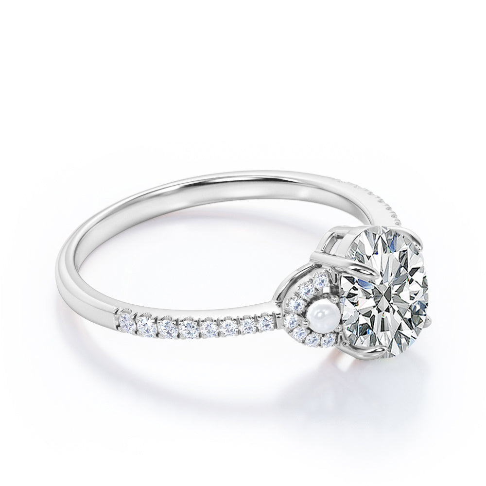 Vintage crescent style 1.35 carat Oval cut Moissanite, diamonds and freshwater pearl engagement ring in Rose gold