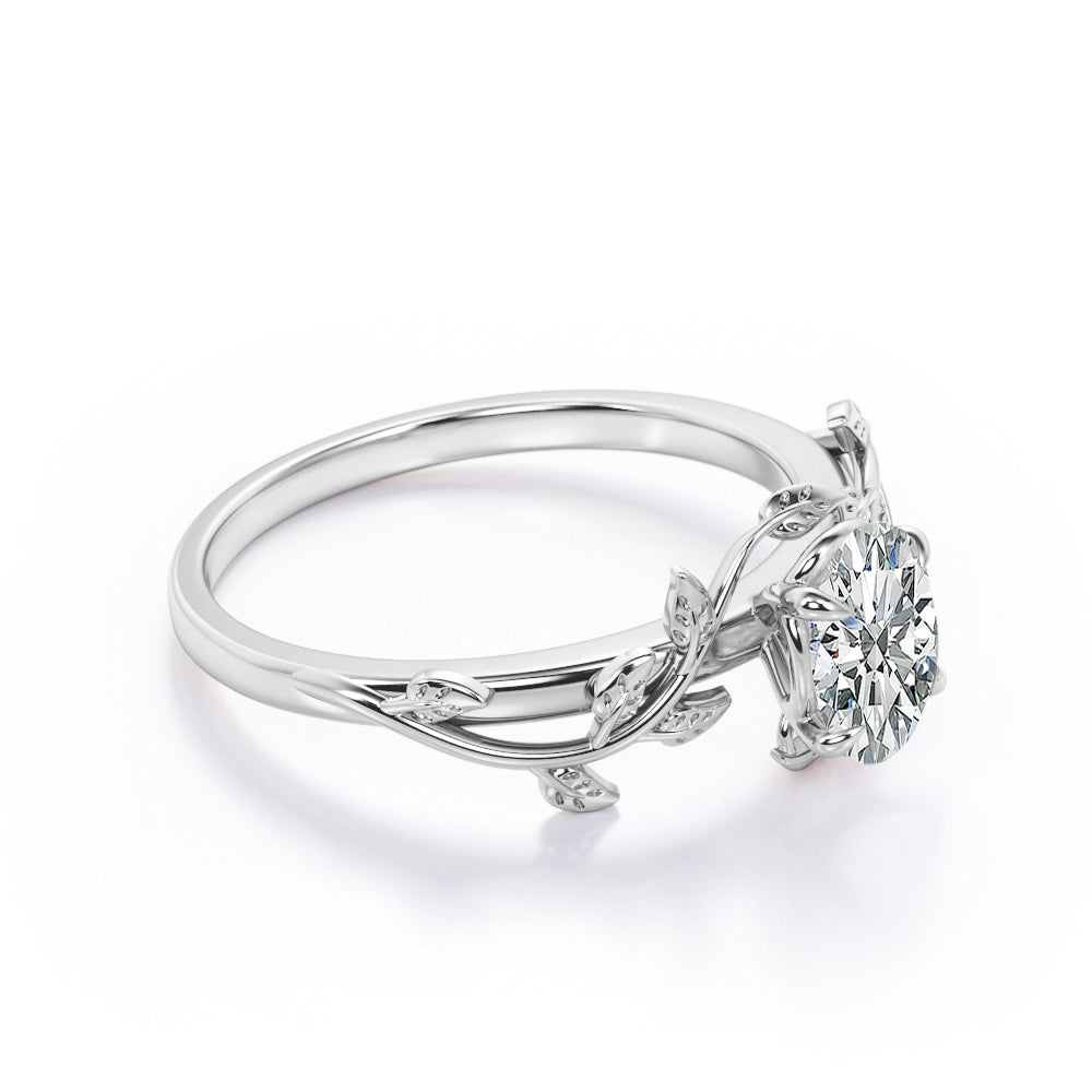 4 prong Solitaire 1 carat Oval cut butterfly style Moissanite Engagement ring for women in gold