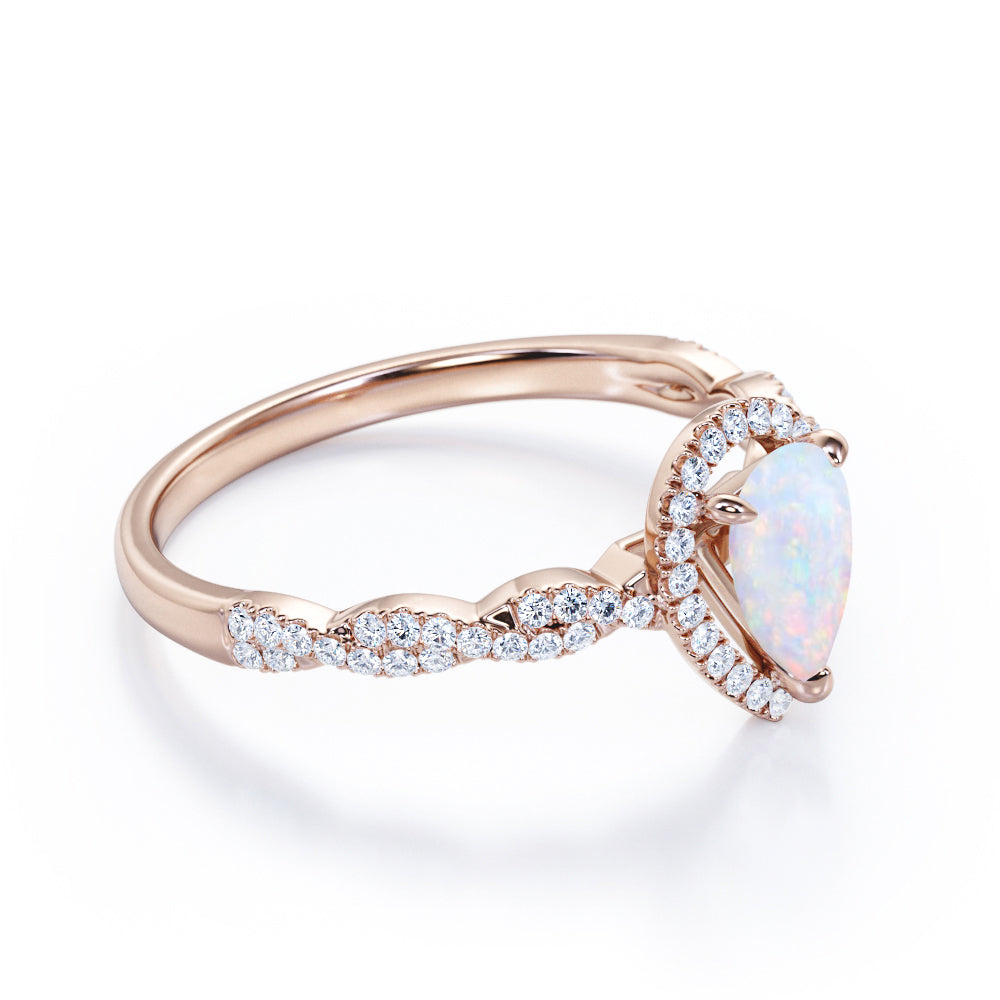 Antique infinity 1.5 carat Pear cut Australian Boulder Opal and diamond halo engagement ring in White gold