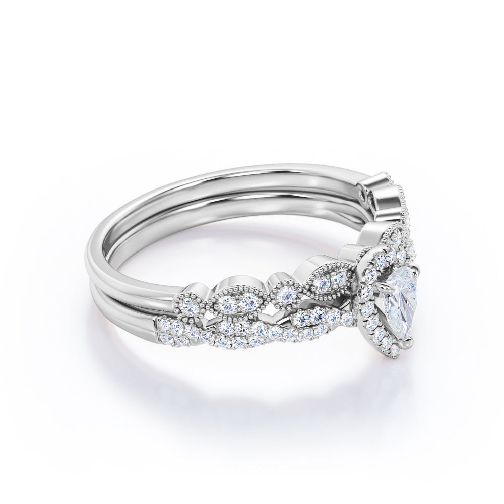 Vintage infinity 1.25 carat Pear shaped Moissanite and diamond milgrain and halo Bridal set in Rose gold