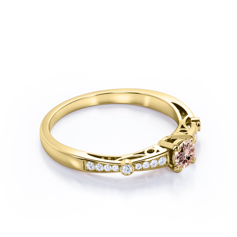 Prong style 0.75 carat Round cut Peach Pink Morganite and diamond tapered baguette engagement ring in White gold