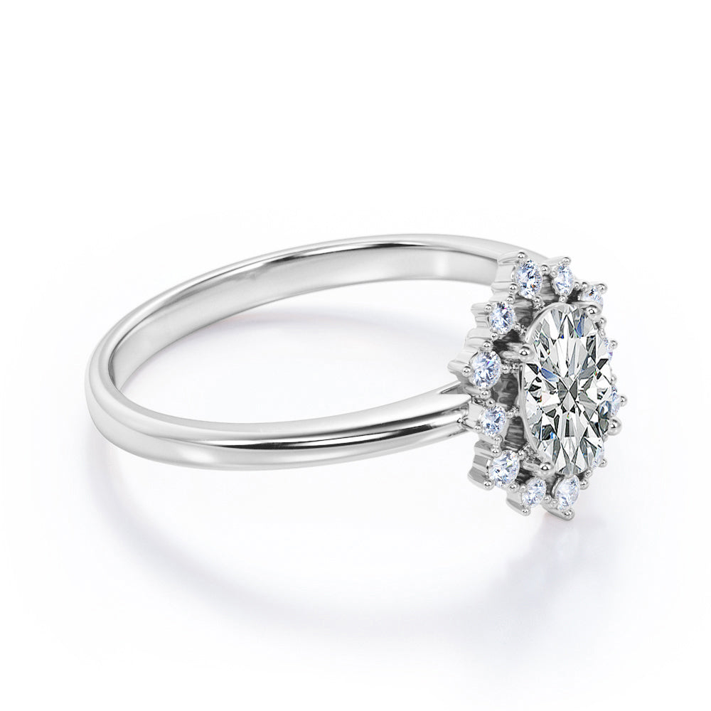 Snowflake cluster 1.25 carat Oval cut Moissanite and diamonds Halo engagement ring in Rose gold