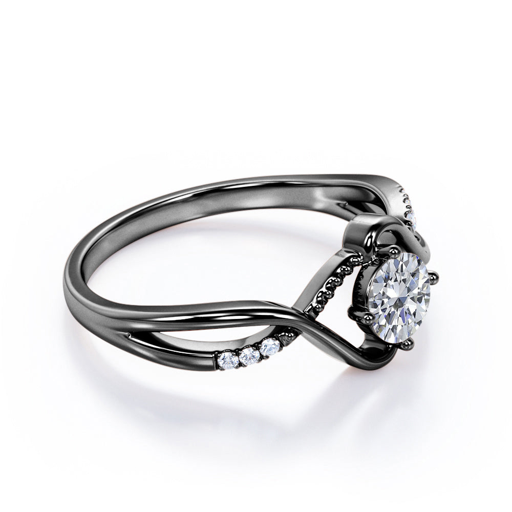 Vintage style twisted 1.25 Round cut Moissanite and diamond infinity engagement ring in Rose gold