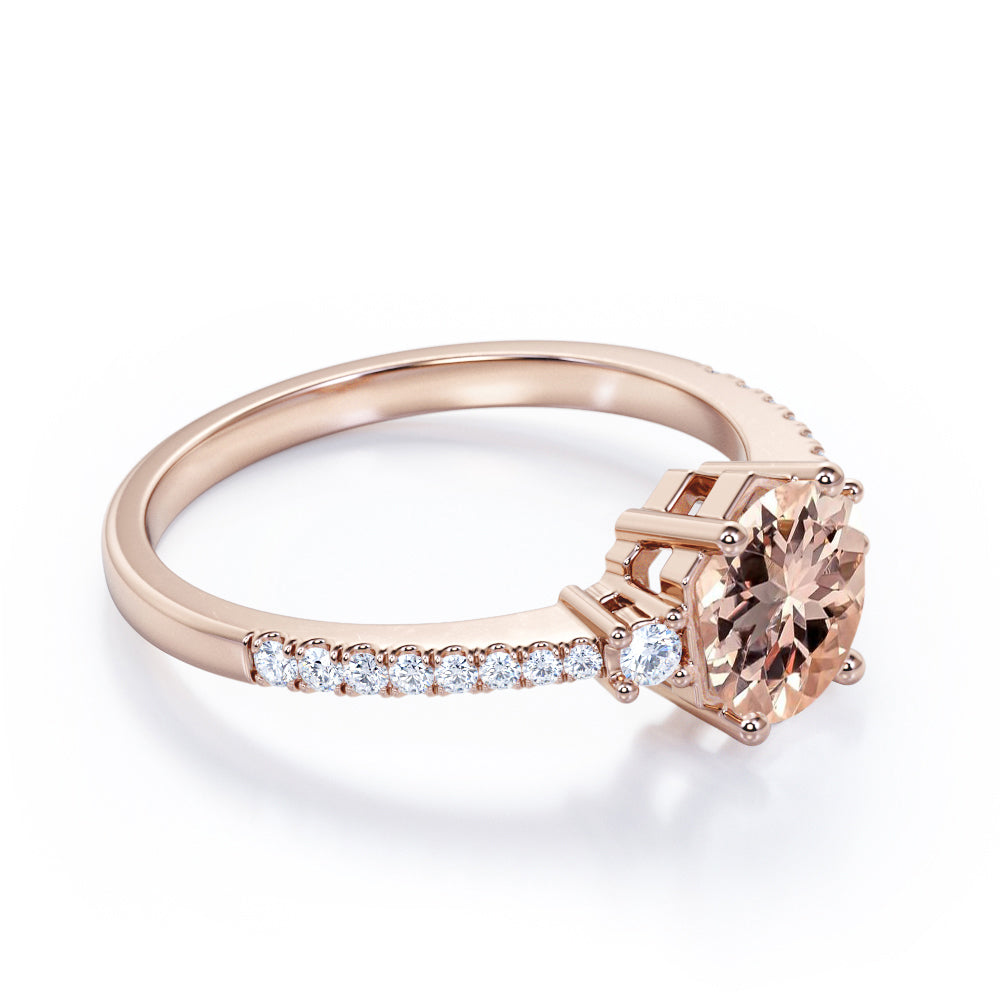 Asymmetric Bezel 1.25 carat Round cut Peach Morganite and diamond eternity style three stone wedding ring set in Yellow gold