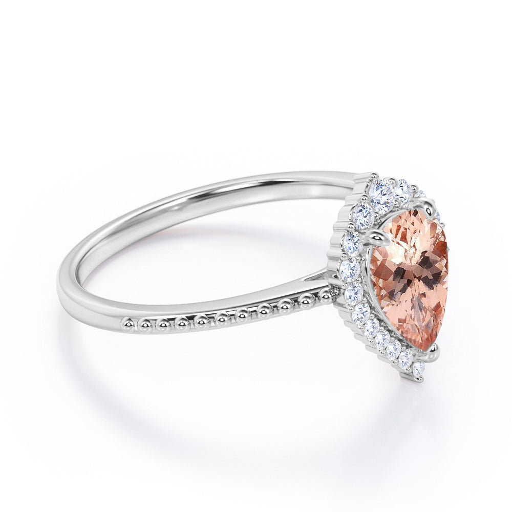 Eccentric Halo 1.25 carat Pear cut Morganite and diamond engraved vintage style engagement ring in Rose gold