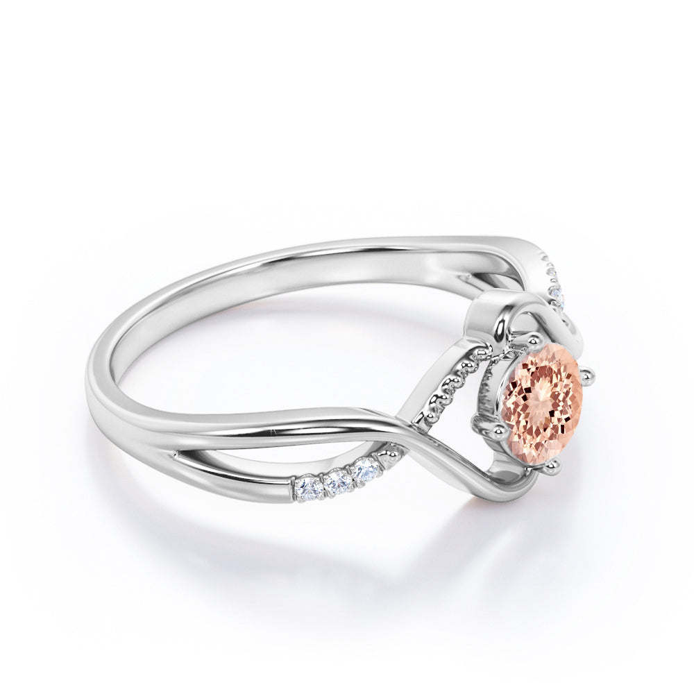 Infinity Twisted 1.15 carat Round cut Morganite and diamond Milgrain anniversary ring for women in Black gold