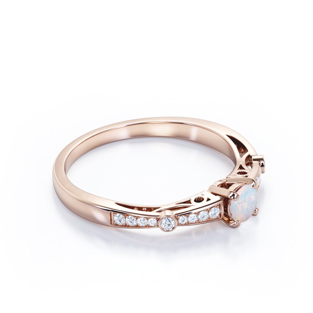 Artistic 0.66 carat Round cut Natural Ethiopian Opal and diamond art deco style engagement ring in Yellow gold