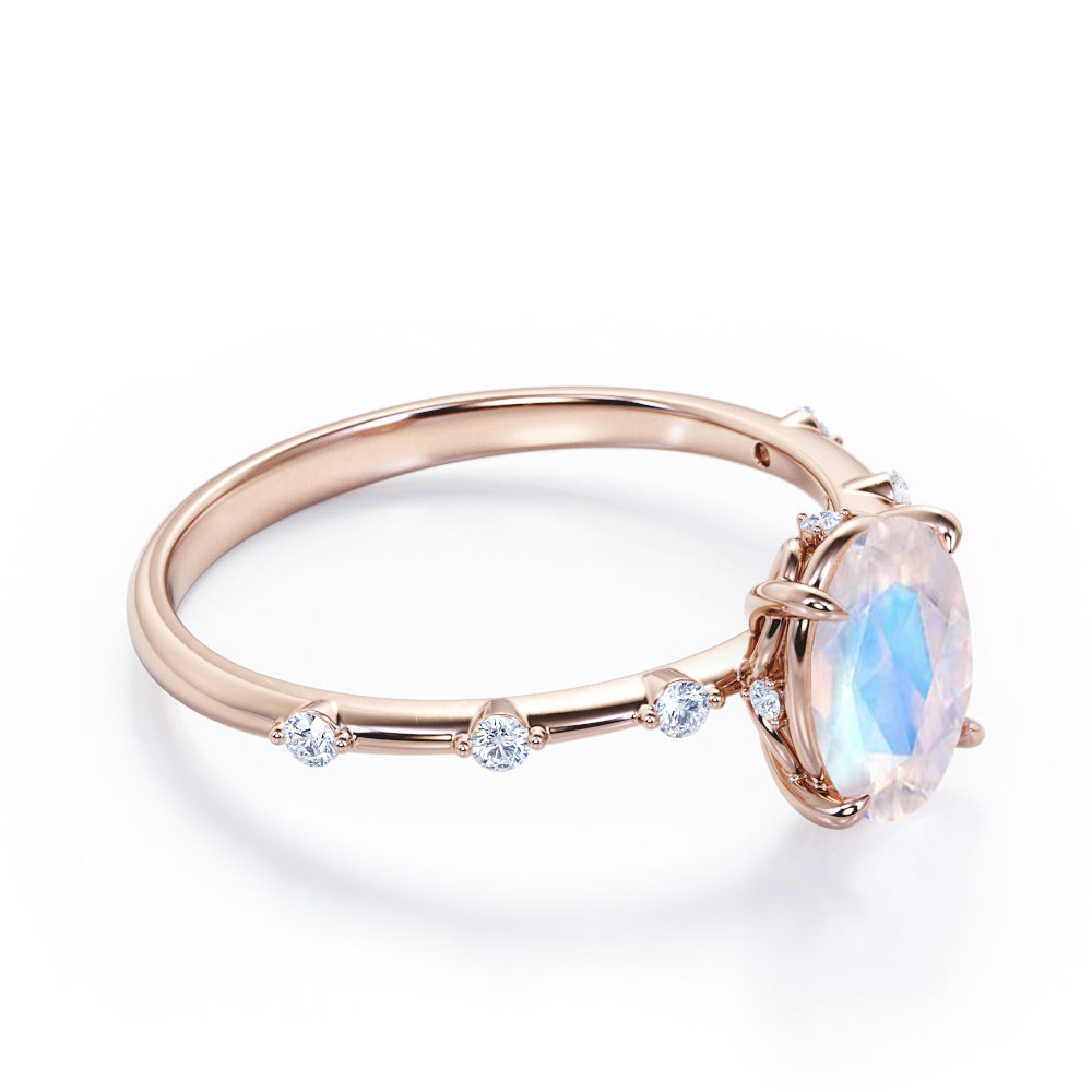 Branch Twig 1.1 carat Oval shaped Moonstone and diamond dainty engagement ring in Black gold