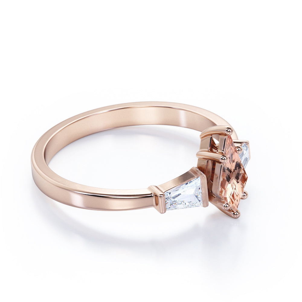Baguette style 1.1 carat Kite shaped Morganite and diamond three stone anniversary ring in Black gold