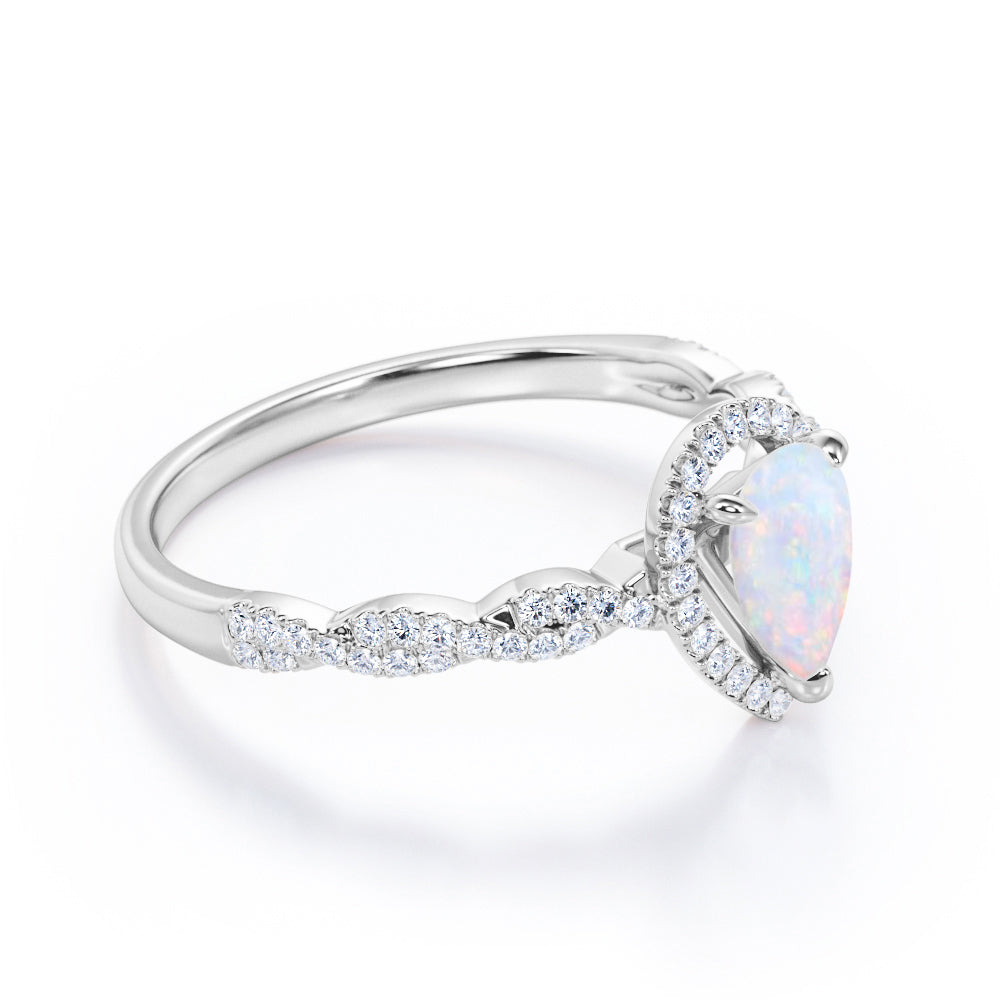 Antique infinity 1.5 carat Pear cut Australian Boulder Opal and diamond halo engagement ring in White gold