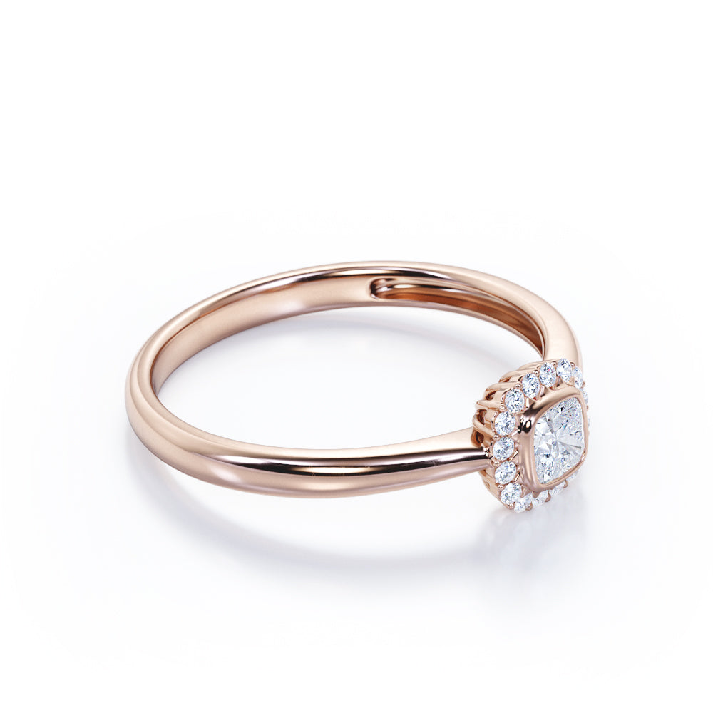 Halo solitaire 0.6 carat Cushion cut Moissanite and diamonds pinched shank engagement ring in yellow gold