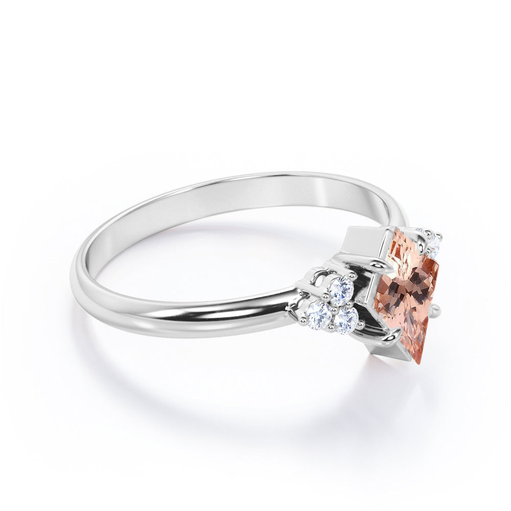 Affordable 1.2 carat Kite shaped Peach Morganite and diamond claw prong engagement ring in Rose gold