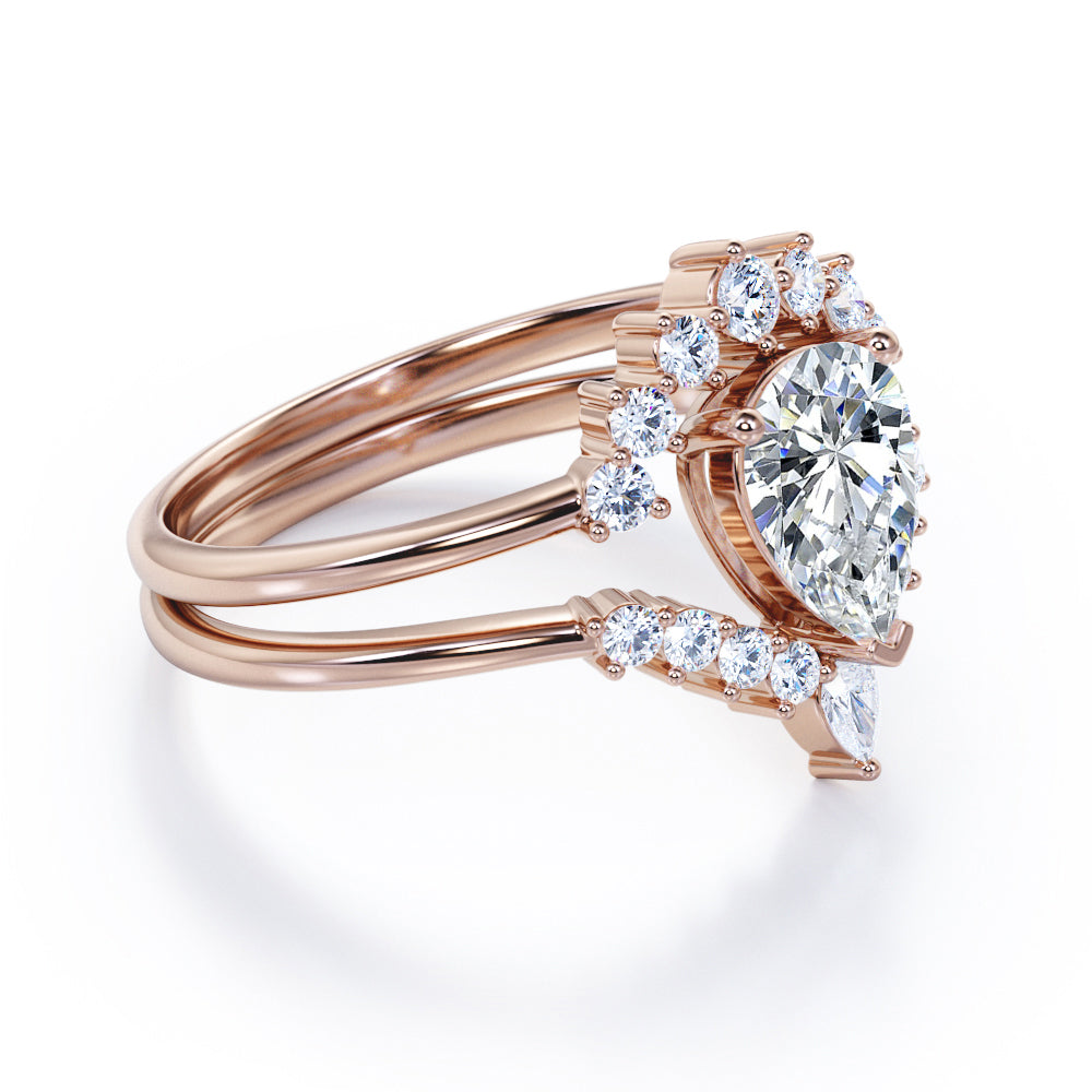 Tiara Inspired 1.25 carat teardrop shaped Moissanite and diamonds Bridal set for women in Rose gold