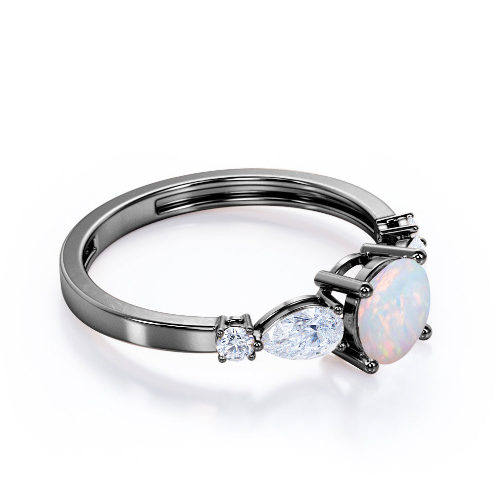 Eccentric 1.25 carat Round cut Ethiopian Opal and marquise and dot diamond engagement ring in Rose gold