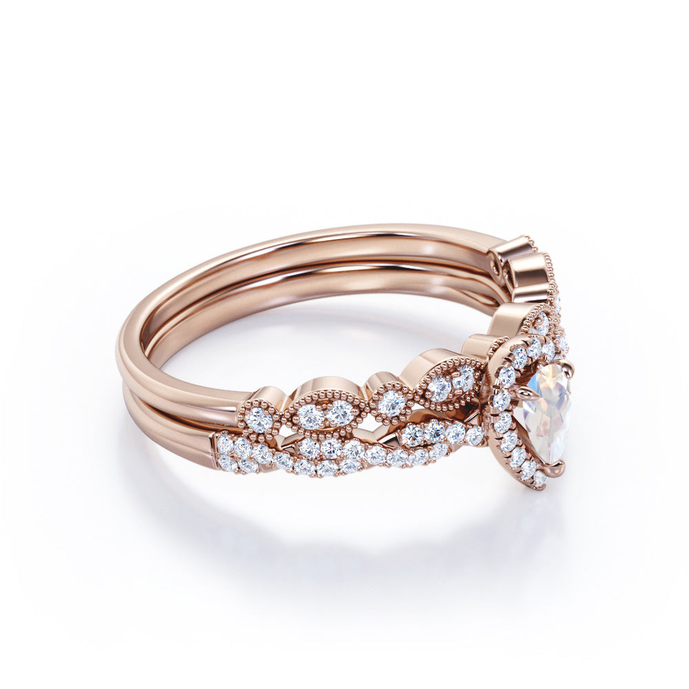 Art deco Milgrain 1.65 carat Pear cut Moonstone and diamond twisted pave engagement ring in yellow gold