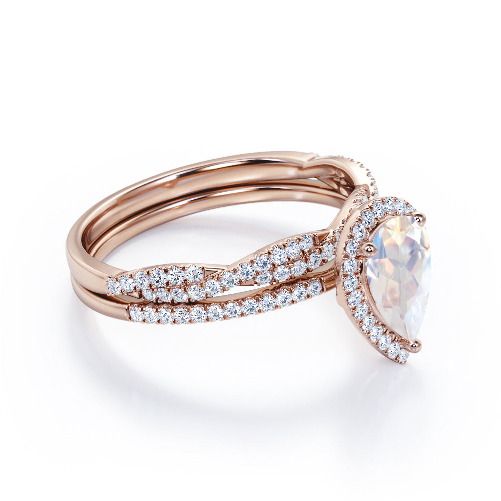 Exquisite 1.75 carat Pear cut Rainbow Moonstone Engagement ring with matching half eternity wedding ring band in gold