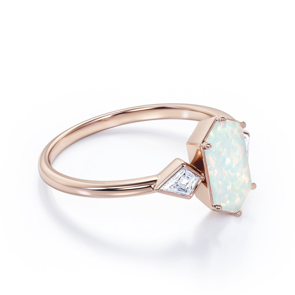 Elongated 1.10 carat Hexagonal Opal and marquise diamond bezel set engagement ring in Black gold
