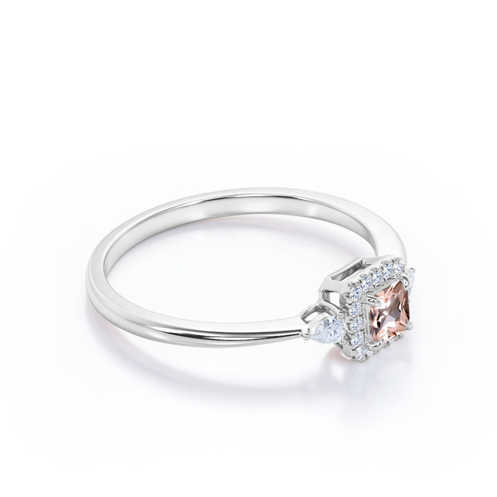 Exquisite three stone 0.75 carat Princess cut Peach Pink Morganite and diamond tapered style anniversary ring in Yellow gold