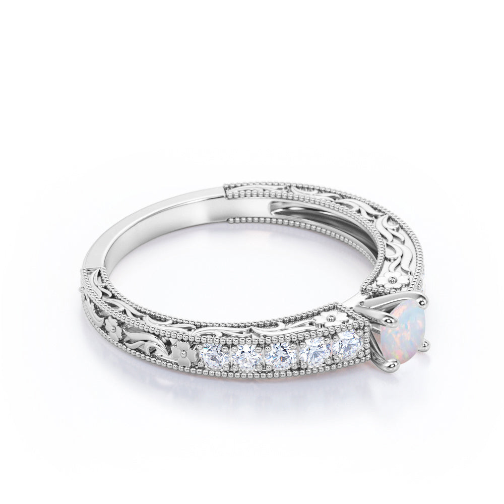 Bead Décor 0.6 carat Round cut Austrlian Opal and diamond channel set engagement ring for her in Rose gold