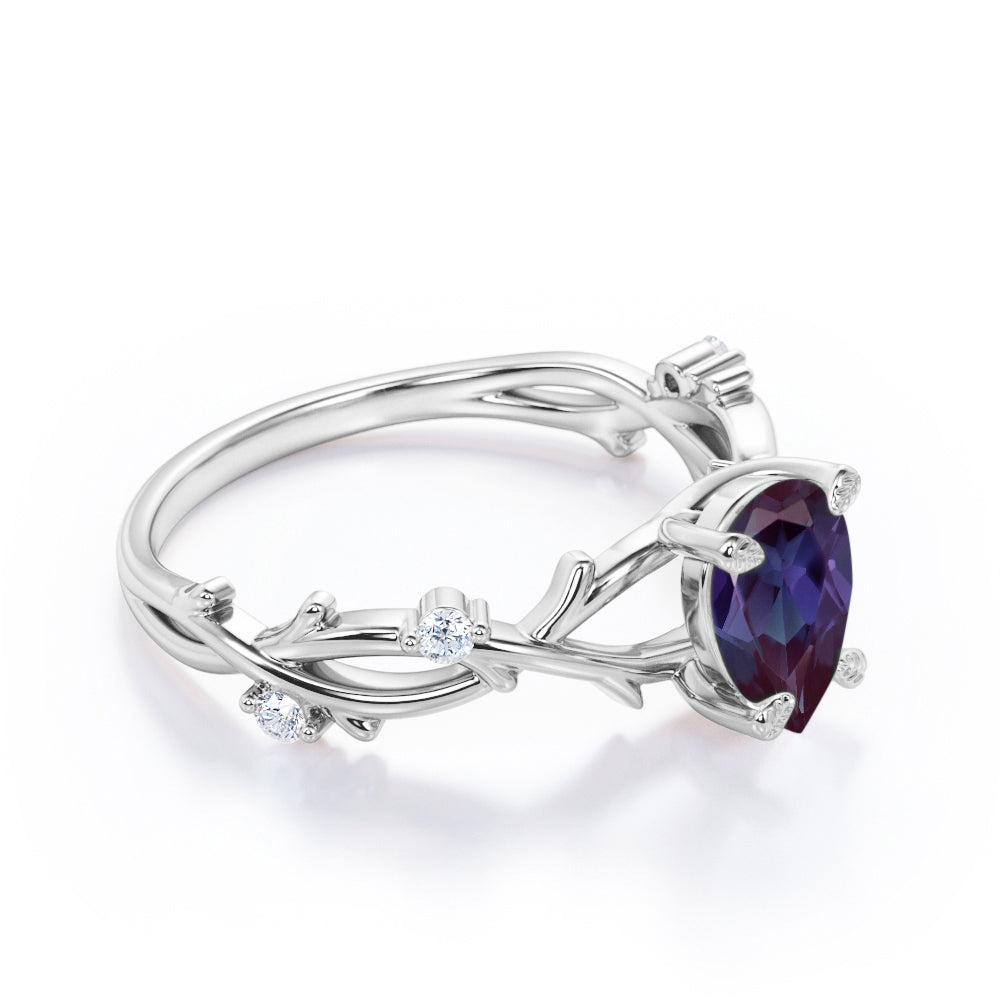 Modern Floral Branches 1 carat Pear shaped Alexandrite and diamond engagement ring for women in Black gold