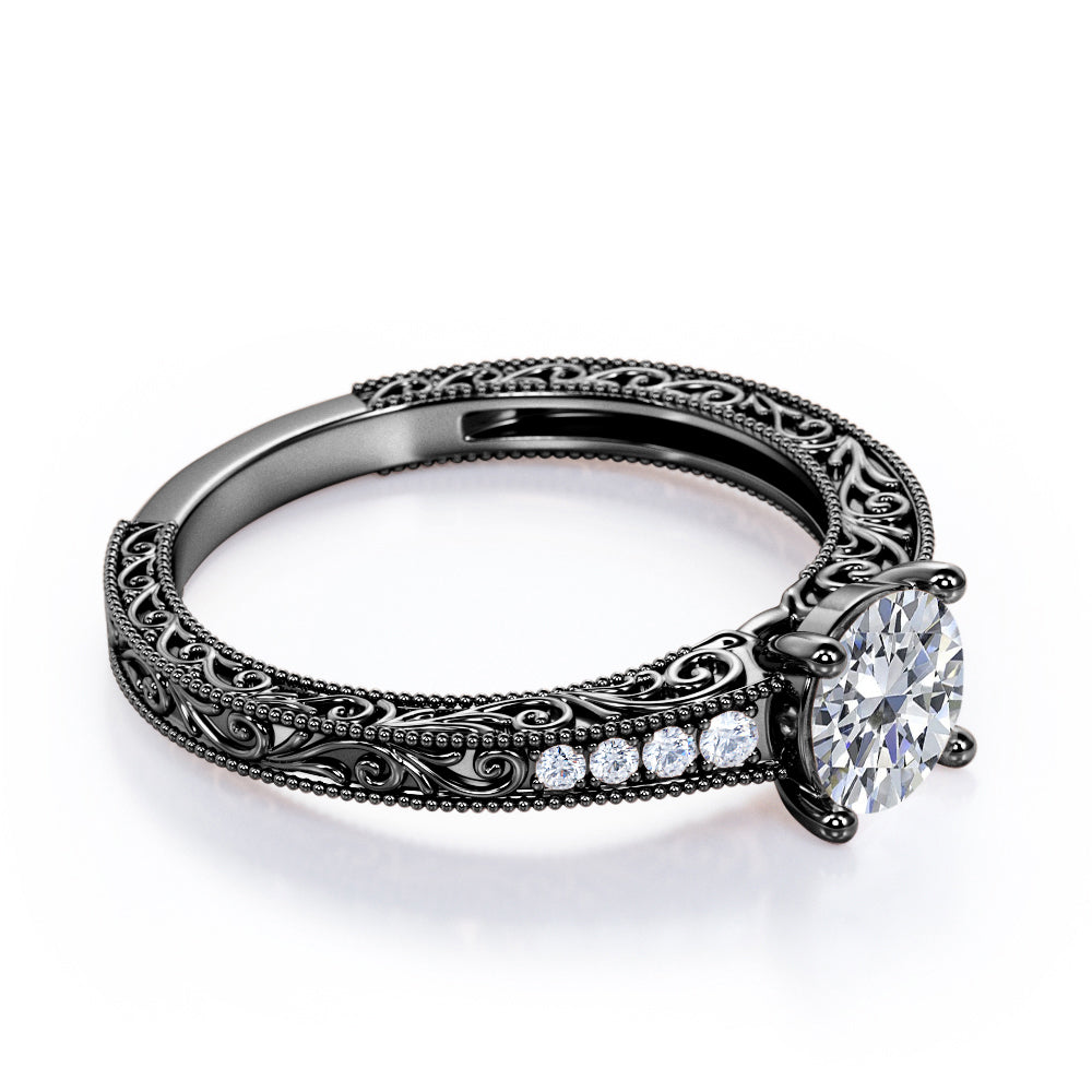 Artistic filigree 1.1 carat Moissanite and diamond low-basket setting engagement ring in White gold